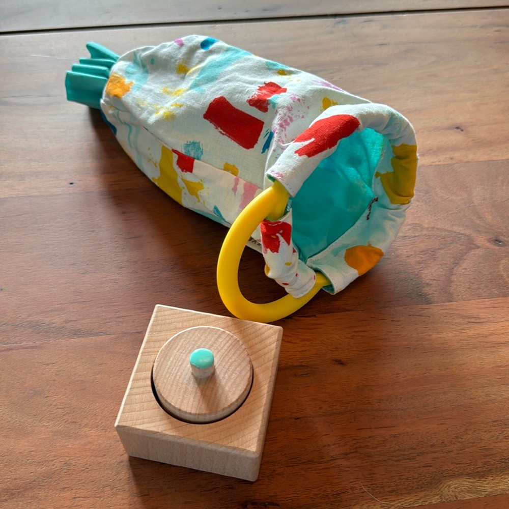 Lovevery pincer puzzle and organic cotton sensory pouch